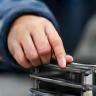 Close-up of quality inspection process on a product